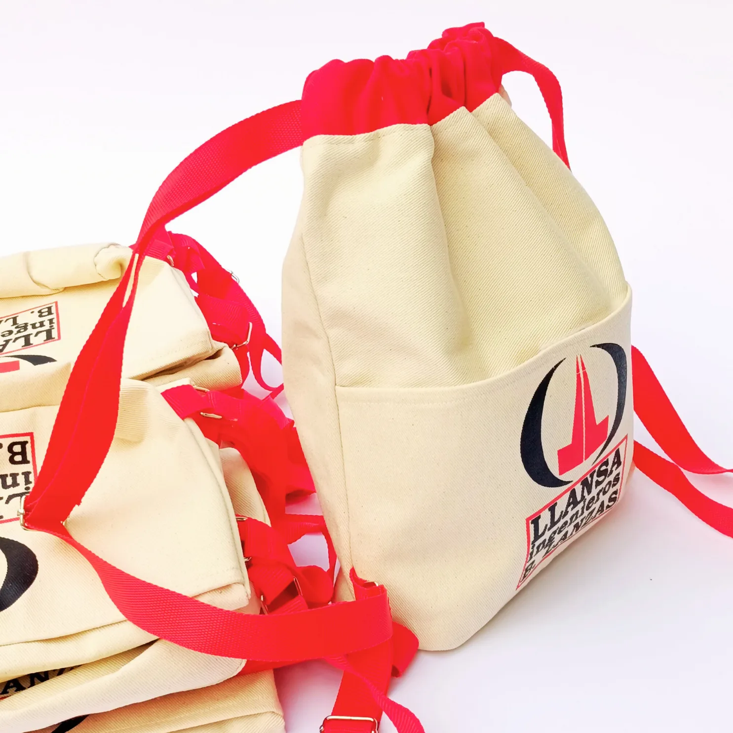 Bolsas promocionales personalizadas para Llansa Ingeniería con tirantes rojos